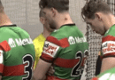 Jai Arrow leads the team out for his 100th appearance for South Sydney