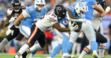 What does the signing of Michael Carter imply for Titans’ backfield?