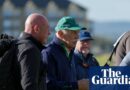 Celtic followers throw tennis balls at membership proprietor Dermot Desmond throughout golf match